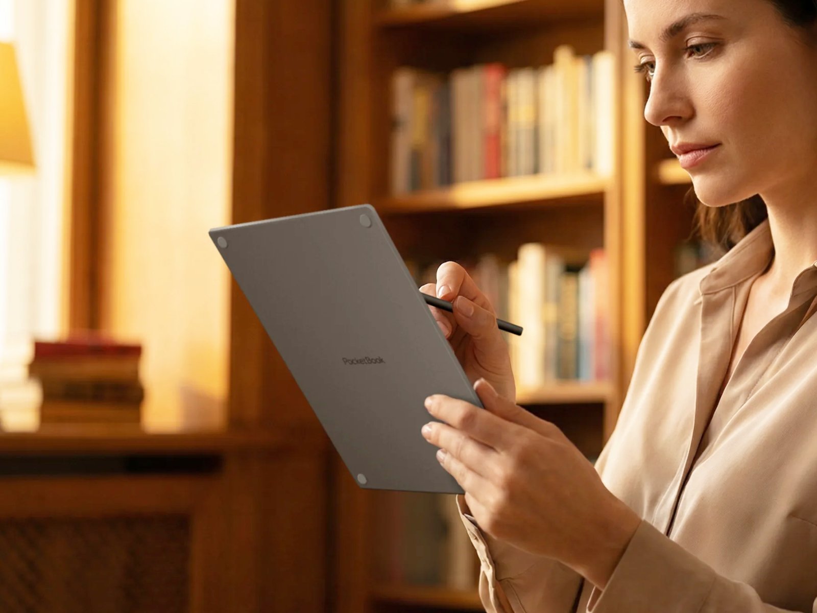 The PocketBook InkPad One e-reader, featuring a 10.3-inch E Ink display and stylus for note-taking, perfect for reading and writing in the UK