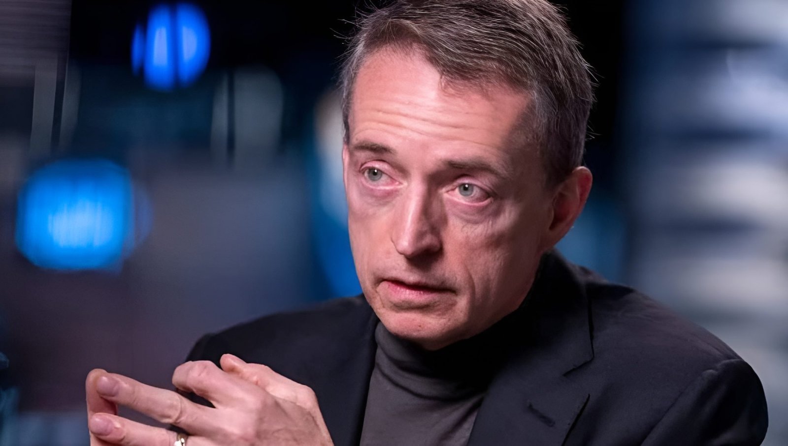 A semiconductor factory in the UK, with workers in colour-coded uniforms, highlighting the importance of chip production in the UK's supply chain resilience and the role of companies like Intel in driving this initiative