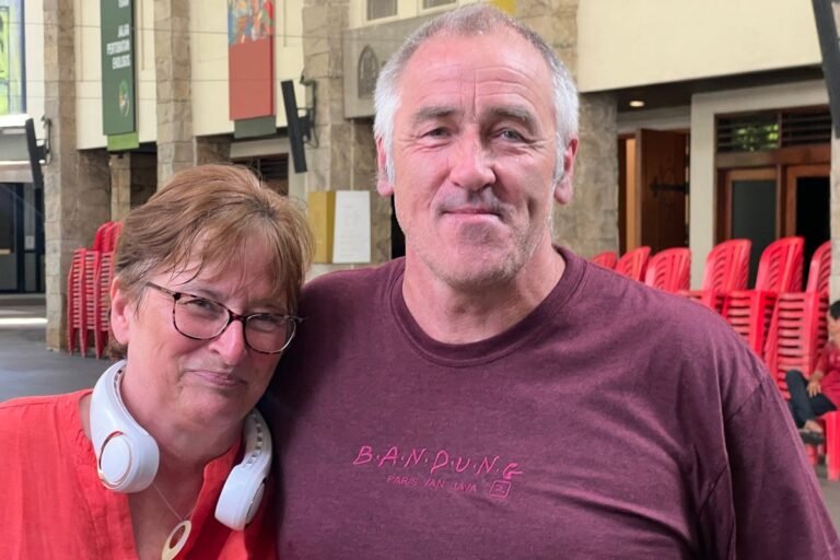 A plane taking off from a UK airport, with a map of the Middle East in the background, highlighting the potential impact of the Iran conflict on UK travel plans to the region