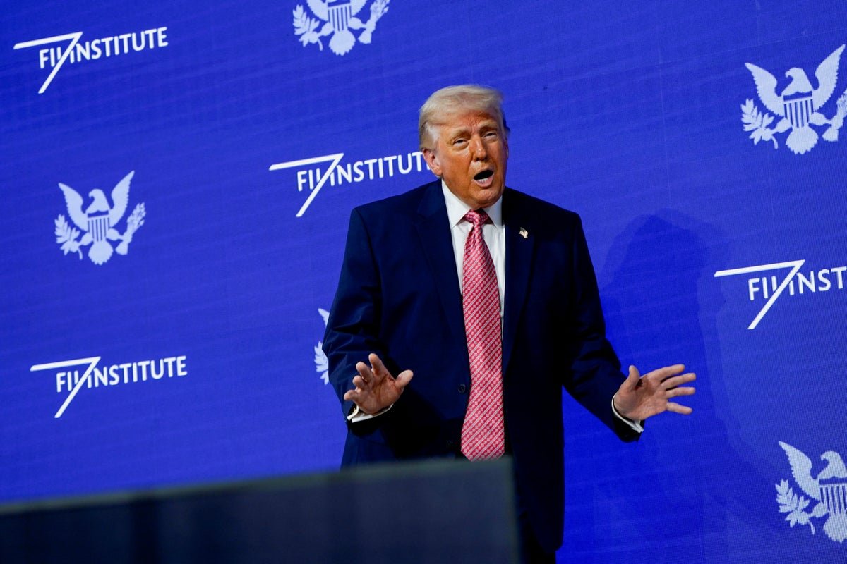 Aerial view of the Strait of Hormuz, with multiple ships passing through the vital shipping lane, highlighting the complexity of the situation and the need for diplomacy in foreign policy