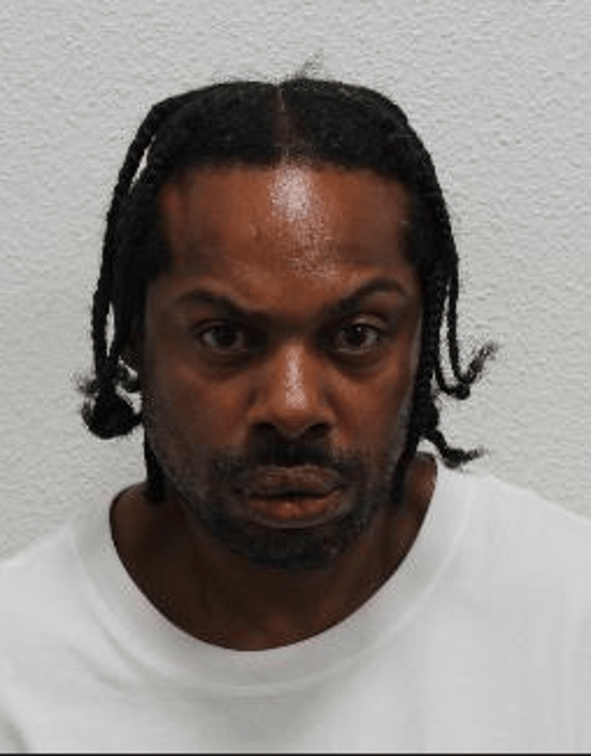 A sombre and reflective image of a court building, symbolising the seriousness of the crime and the importance of justice being served, with a focus on the rape case and its impact on the community, and the need for support and protection for vulnerable individuals