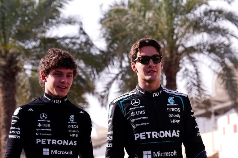 Kimi Antonelli in action during the Japanese GP, showcasing his exceptional driving skills and speed, as he takes the lead in the F1 standings, with the Japanese GP crowd cheering in the background, a sea of colour and excitement