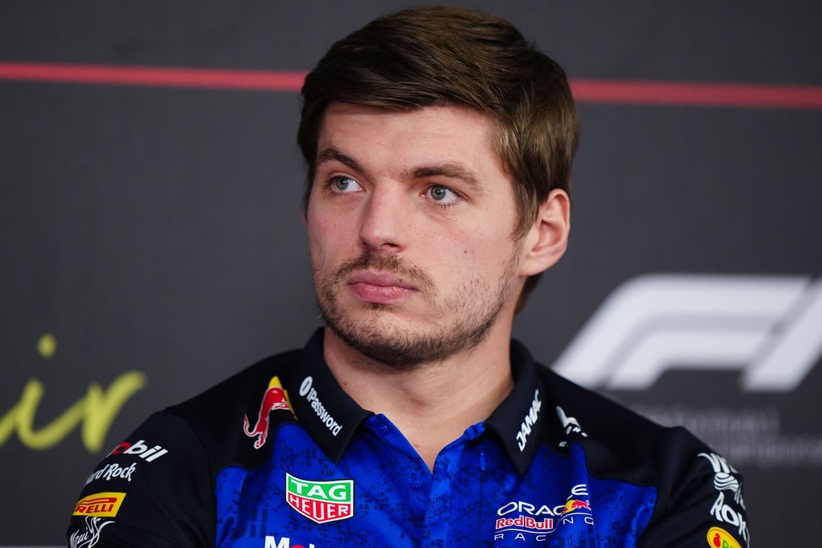 Max Verstappen and Martin Brundle in a heated conversation, with a red flag waving in the background, symbolising the controversy surrounding Verstappen's behaviour, which has sparked a debate about driver accountability in the racing world