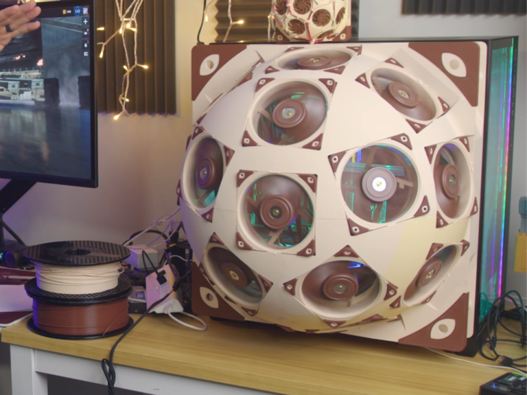 A custom PC side panel featuring fifteen Noctua fans, designed to reduce CPU temperatures and improve overall system performance, with a sleek and modern colour scheme