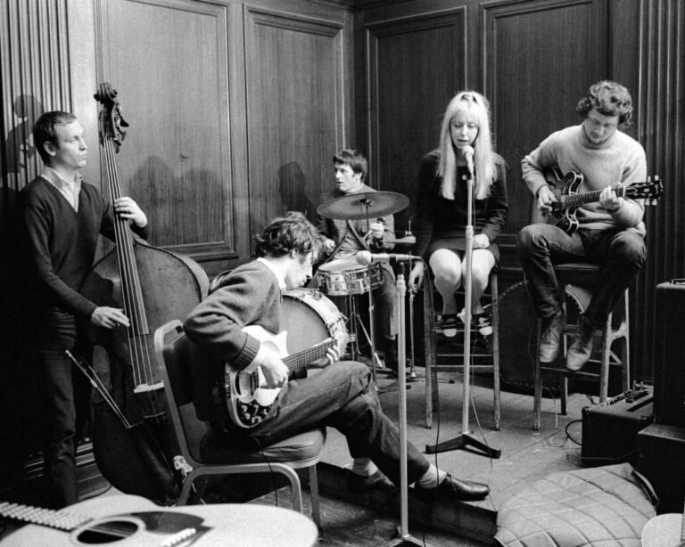 A photo of Terry Cox, a notable figure, with a bright smile and infectious laugh, surrounded by his loved ones, showcasing his remarkable life and legacy, with a mix of colours and vibrant scenery, symbolising his personality and character