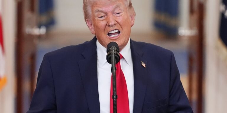 Donald Trump speaking at a podium, with a serious expression, as the situation with Iran continues to unfold, and the potential for conflict is high, with the colour of uncertainty surrounding his actions