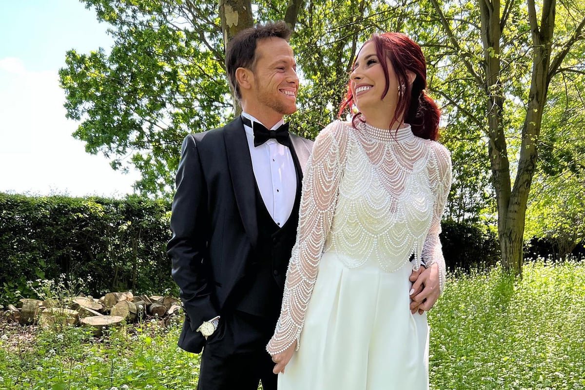 Stacey Solomon and Joe Swash exchanging vows at their Pickle Cottage wedding, surrounded by friends and family, with a beautiful colour scheme and stunning decorations, highlighting their love and commitment to each other
