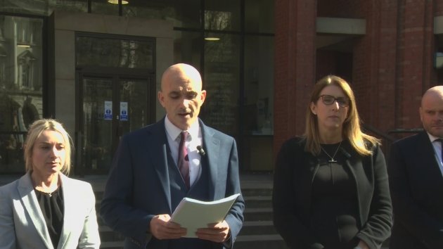 A sombre and respectful image of a memorial service, with flowers and candles surrounding a photograph of the deceased, highlighting the primary keyword phrase human remains