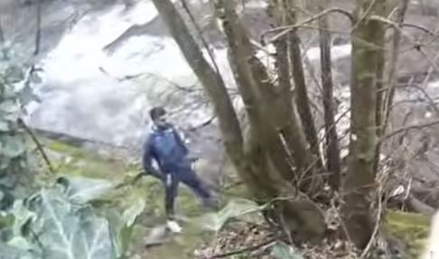 A man being rescued from a river after attempting to evade arrest, with a look of regret on his face as he is pulled to safety by emergency services. The primary keyword phrase 'river rescue' is exemplified in this dramatic scene, which highlights the dangers of impulsive behaviour and the importance of considering the consequences of our actions.