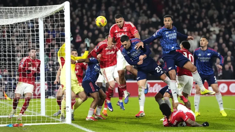 Arsenal players in action during a premier league match