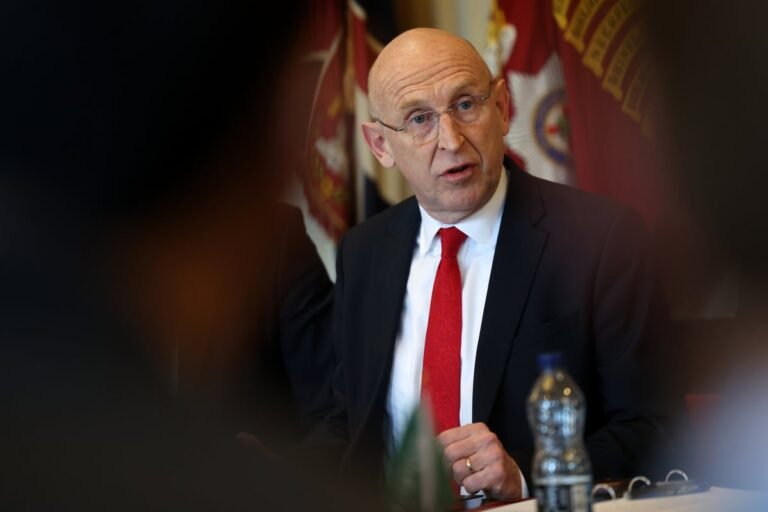 A UK warship sailing through choppy waters, symbolising the country's defence capabilities and readiness to respond to emerging challenges, with a focus on the Iran conflict and its impact on UK industries