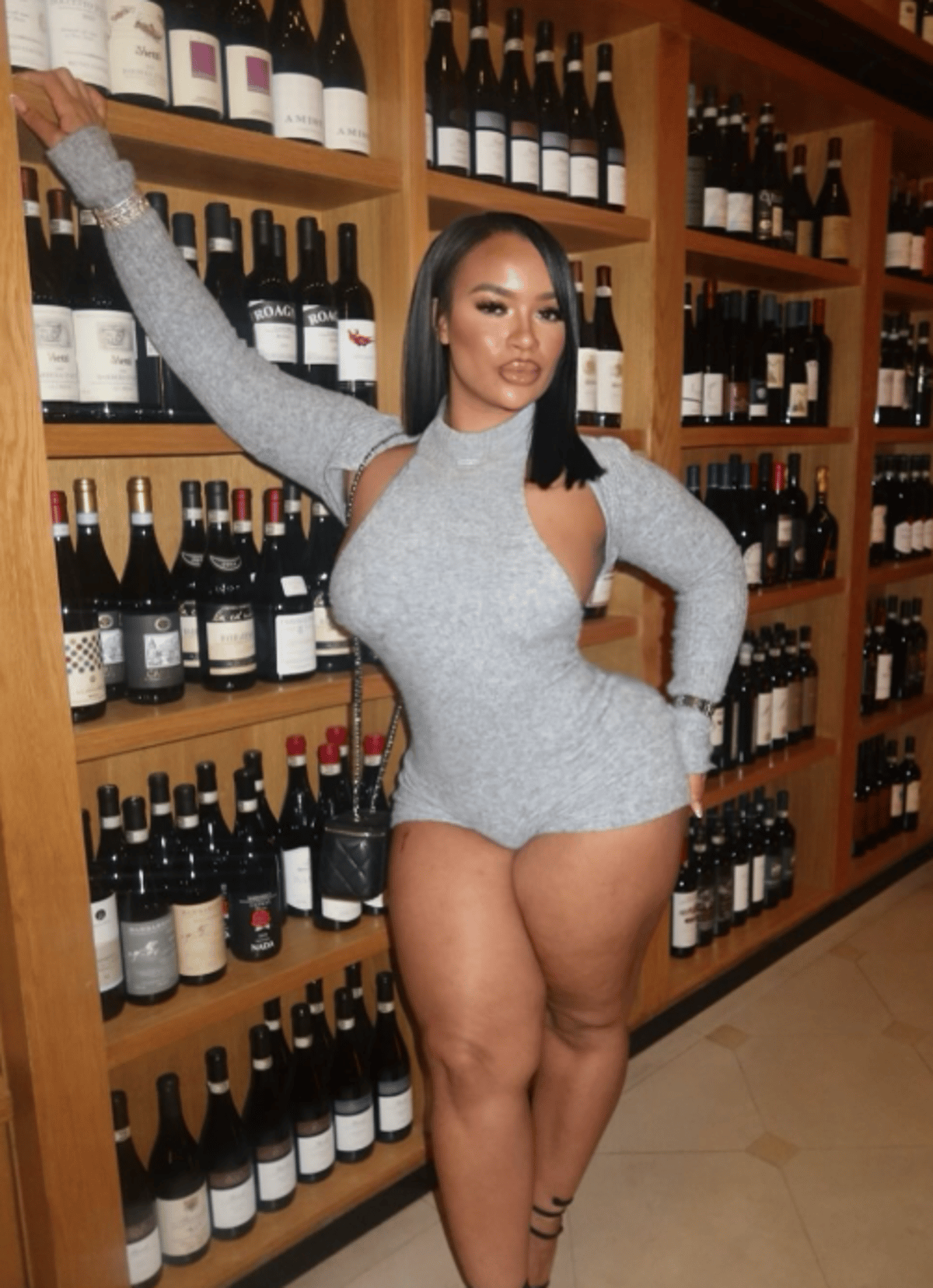 A car is seen outside a hospital in London, where an influencer is being treated for serious injuries after being hit by a car in Soho, with the X Factor finalist charged with attempted murder, highlighting the importance of road safety and responsible behaviour