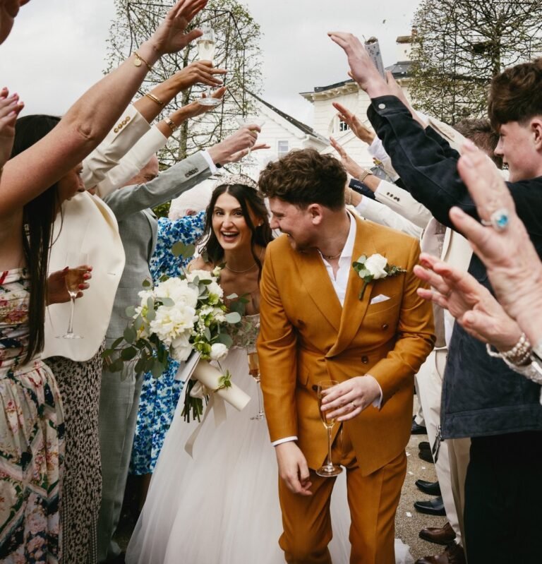 Conor Maynard and Kitty Bertrand share a romantic kiss on their wedding day, surrounded by stunning Icelandic landscapes, a perfect blend of love and nature, Conor Maynard wedding