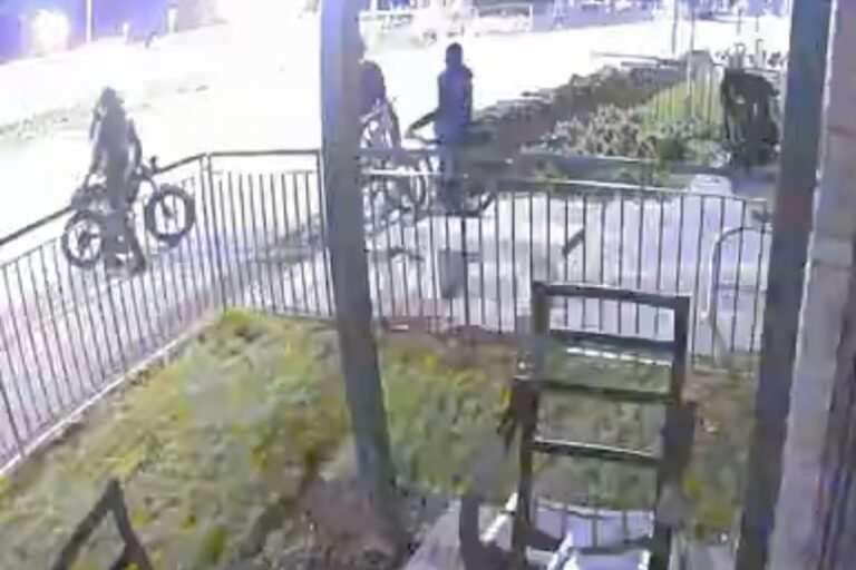 A group of e-bike riders in Edinburgh, captured on camera at night, highlighting the need for increased safety awareness and responsible behaviour among e-bike users, with a focus on the primary keyword phrase e-bike gang