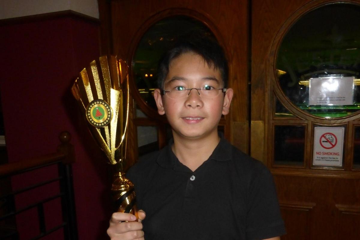 Young Reading snooker player with trophy