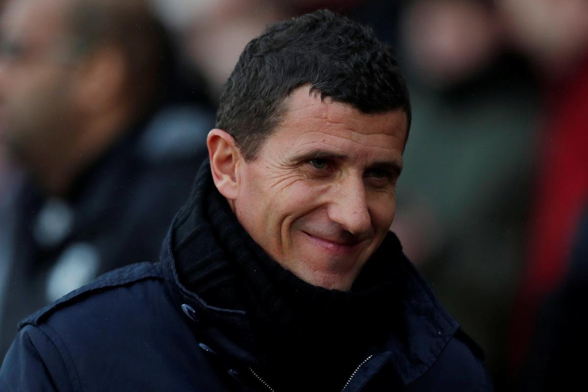 Watford FC fans cheering at a match