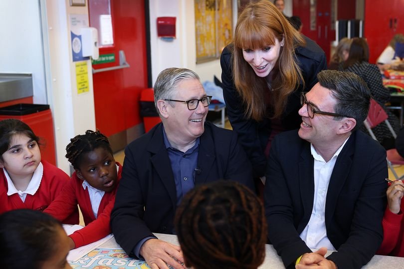 Labour leaders Keir Starmer, Andy Burnham, and Angela Rayner visiting a school in Greater Manchester, interacting with students and teachers, discussing education and behaviour