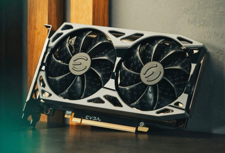 A close-up of a defective graphics card with a 16-pin power connector, highlighting the potential risks and consequences of poor design and manufacturing