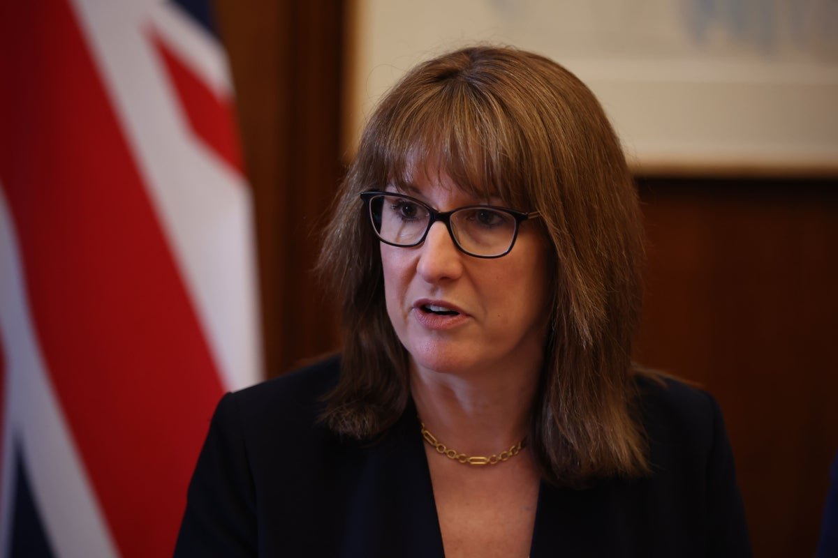 A UK military personnel in uniform, with a union jack flag in the background, symbolising the country's defence strategy and commitment to security, with a focus on the ongoing defence boost and its potential impact on UK security