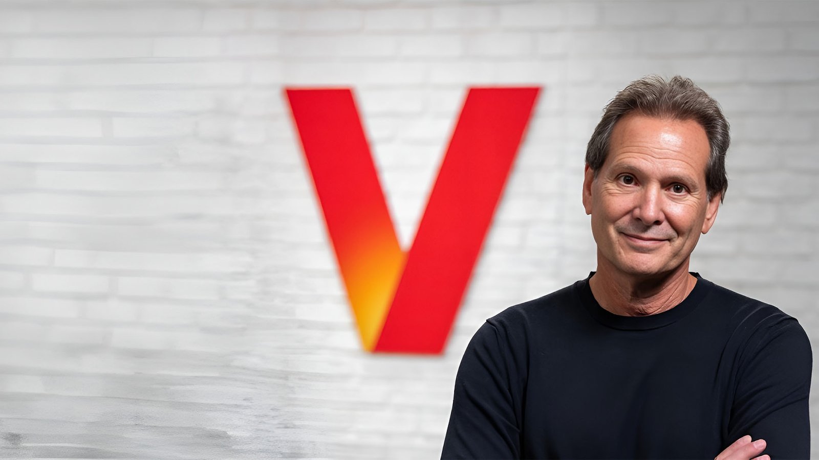 Verizon CEO Dan Schulman speaking at the Semafor World Economy conference, highlighting the importance of customer experience in the UK telecoms market, with a focus on treating customers like people, not accounts, to drive business success and growth