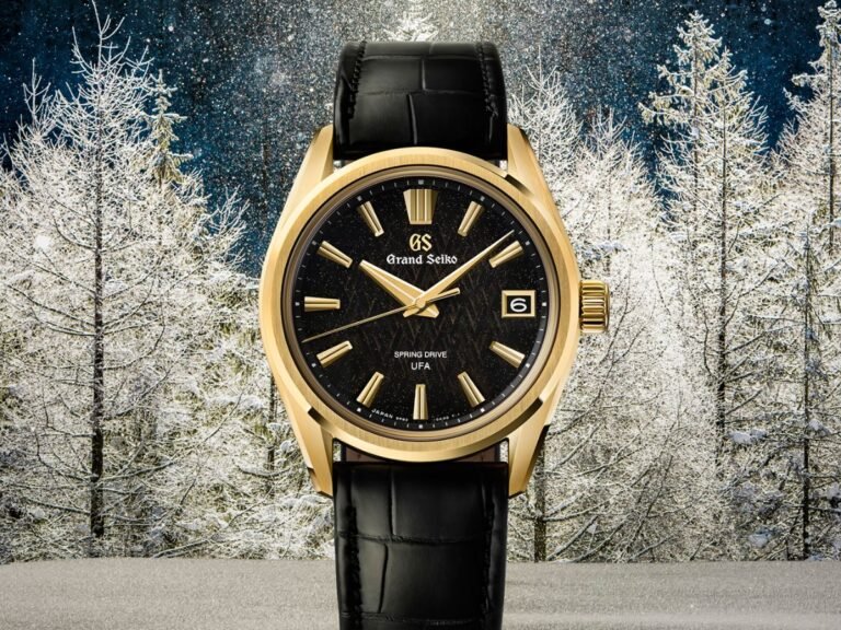 The Grand Seiko Evolution 9 Spring Drive U.F.A. SLGB006 watch, featuring a gold casing and black leather strap, with a gold flecked watch face, a true masterpiece of horology, available in the UK, with its unique blend of style and functionality, this luxury watch is sure to turn heads, with its sleek design and elegant colour scheme, making it a versatile accessory for any occasion