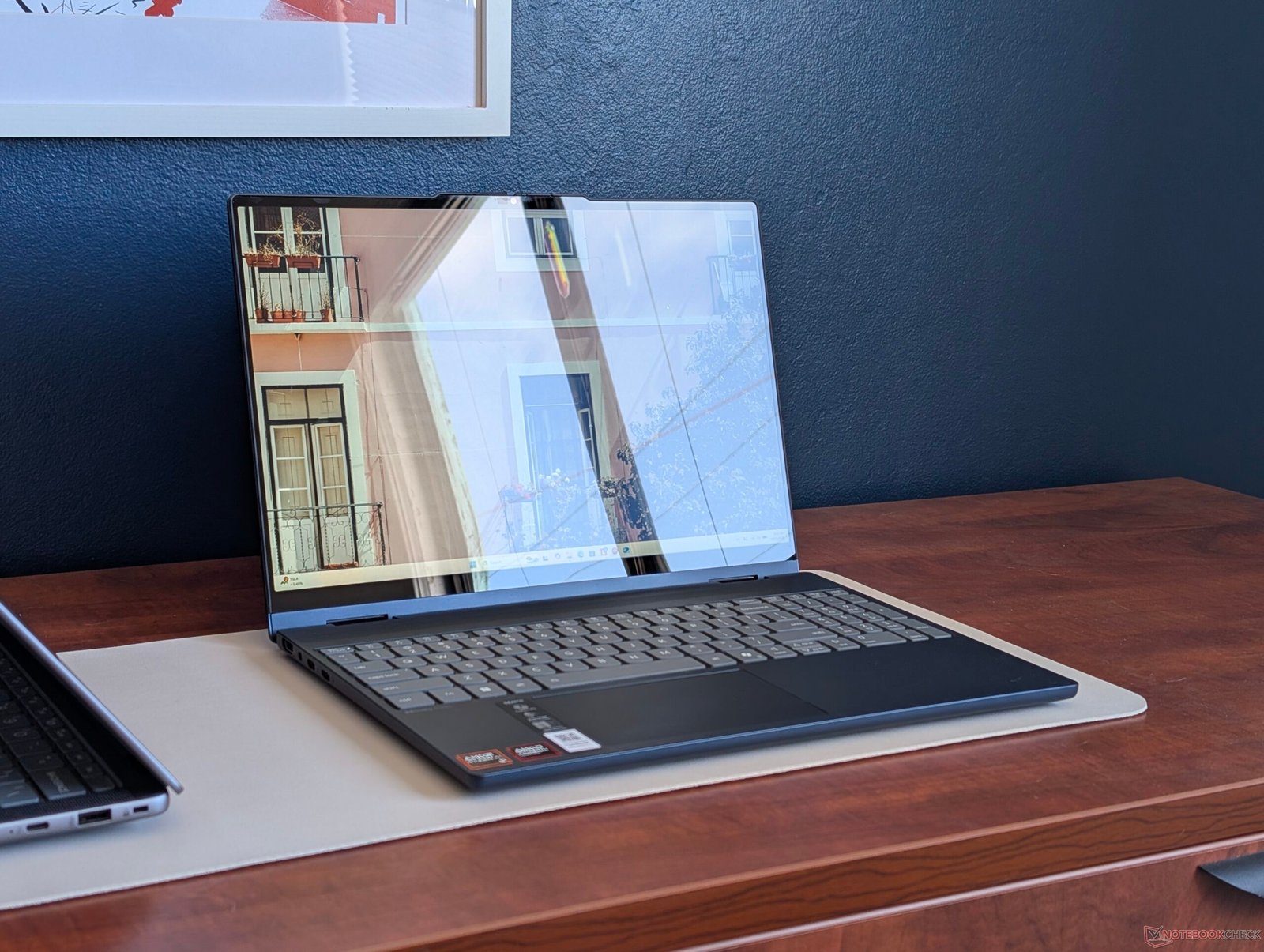 The Lenovo IdeaPad 5a with an OLED display, showcasing its vibrant colours and stunning visuals, perfect for those seeking a high-quality 2-in-1 device in the UK, with a focus on the OLED upgrade
