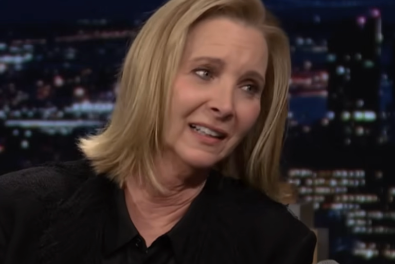 Lisa Kudrow as Phoebe Buffay in Friends, with a shocked expression, sparking a heated debate amongst fans with her candid opinion on a character's behaviour, which has been a topic of discussion for years, with many fans taking to social media to discuss and dissect her words, and to analyse the character's behaviour in the context of the show's overall narrative