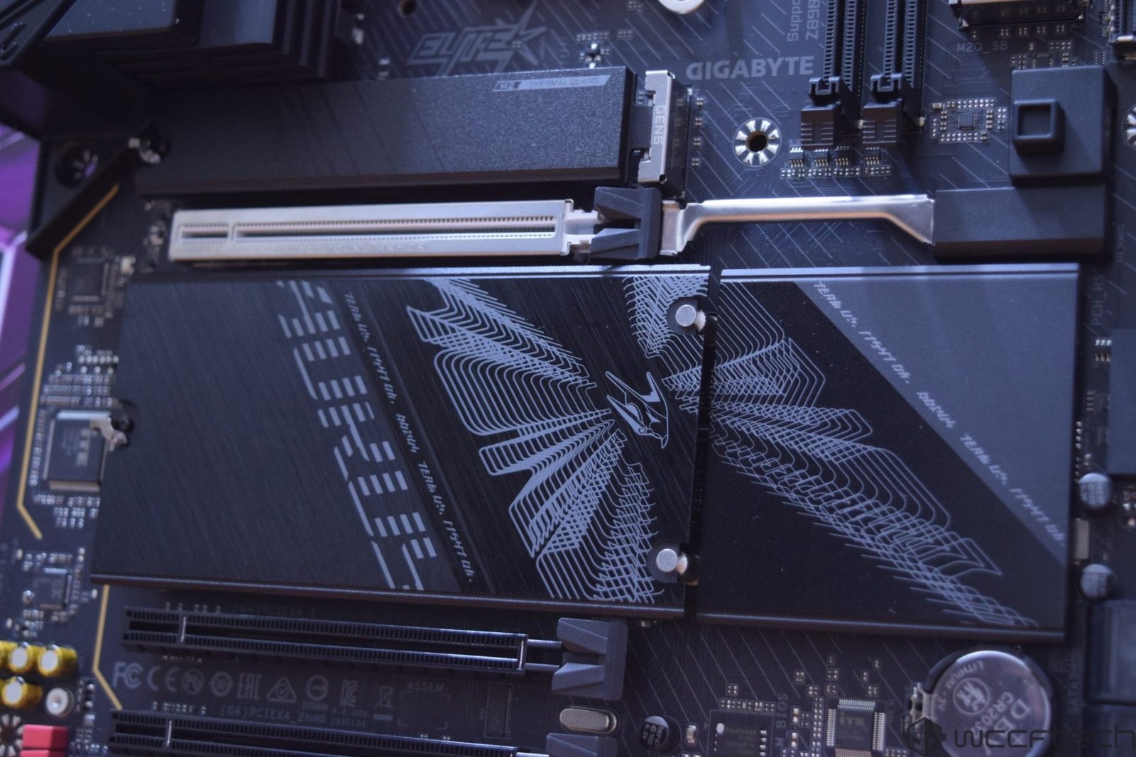 A close-up of the Gigabyte Z890 AORUS Elite DUO X Motherboard, showcasing its sleek design and advanced components, with a focus on the Intel 800-series chipset and Core Ultra 200S CPU, highlighting the UK's thriving gaming and computing scene.