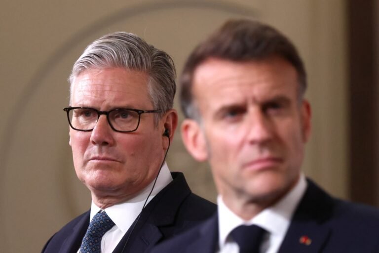 Aerial view of the Strait of Hormuz, with multiple ships passing through the busy shipping lanes, highlighting the importance of the region for international trade and the need for nations to work together to maintain stability, with the primary keyword being Strait of Hormuz