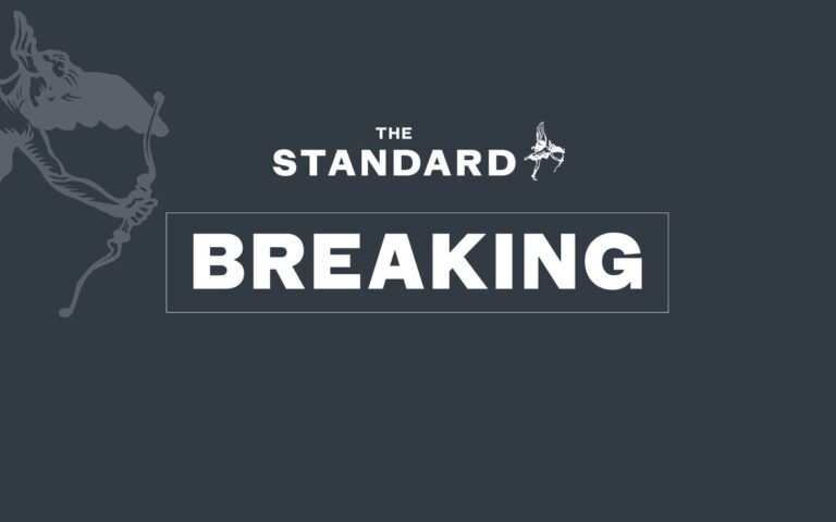 Aerial view of Hendon, north London, with a Jewish business in the foreground, highlighting the impact of the arson attack on the local community, with a focus on the primary keyword phrase 'Hendon arson attack'