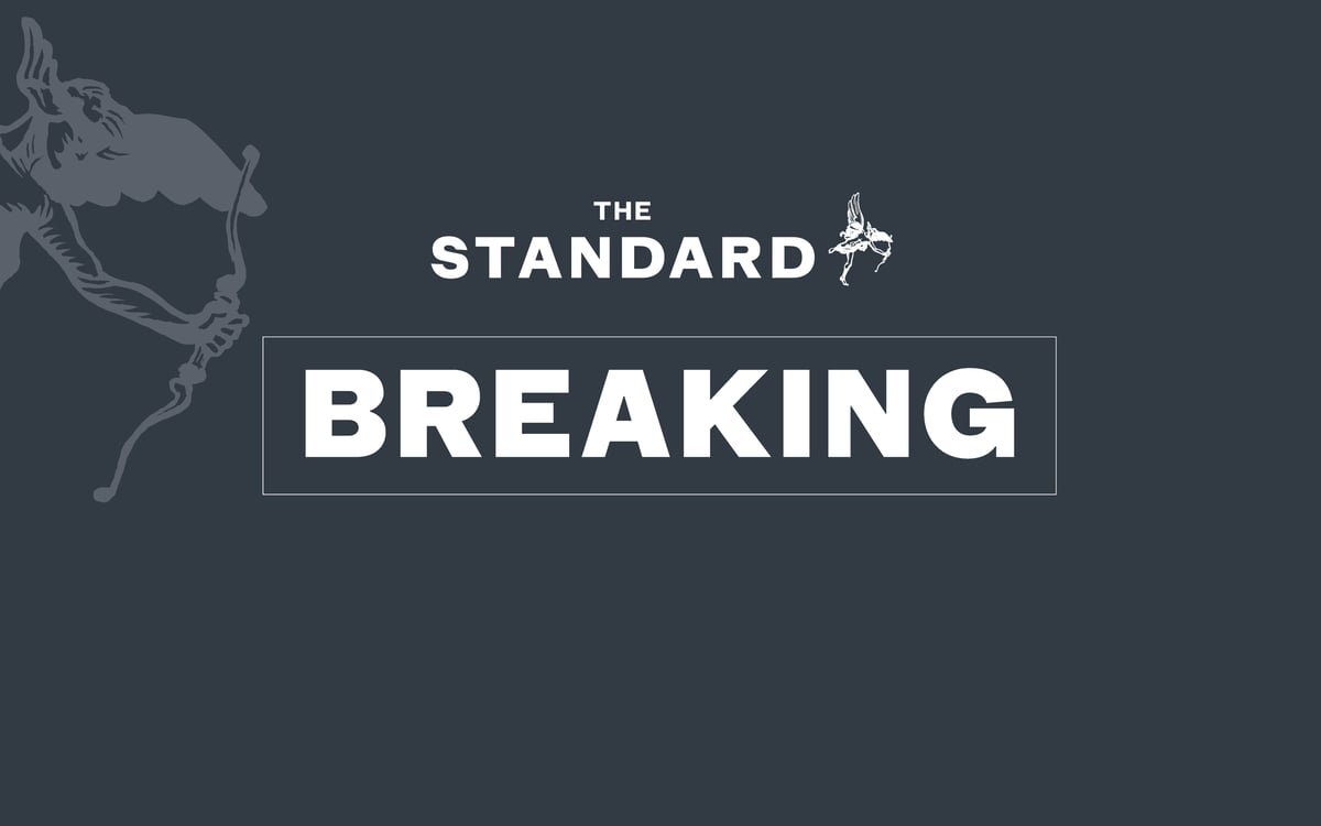 Aerial view of Hendon, north London, with a Jewish business in the foreground, highlighting the impact of the arson attack on the local community, with a focus on the primary keyword phrase 'Hendon arson attack'