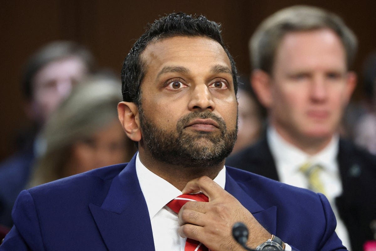 FBI Director Kash Patel speaking at a press conference, with a serious expression, discussing the alleged 2020 election fraud, with a backdrop of the American flag, symbolising the nation's trust in the electoral process