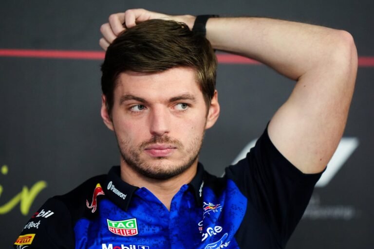 Formula One cars racing on a track with a focus on safety, featuring Max Verstappen and other drivers, with a description of the new rule changes and their impact on the sport, including the primary keyword phrase 'Formula One rule changes'