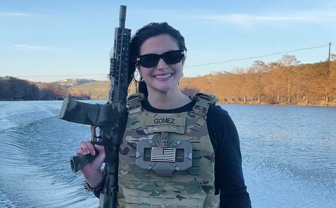 A photo of a person holding a sign that reads 'No to Hate Speech' with a diverse group of people in the background, highlighting the importance of promoting respect and understanding in the face of anti-Muslim rhetoric and racist attacks