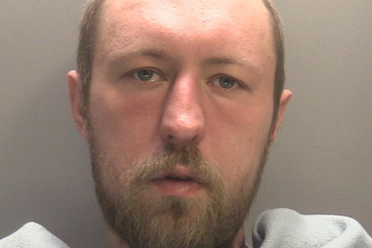 A Sikh woman in traditional clothing, with a blurred background of a gurdwara, highlighting the importance of religious tolerance and respect, with a focus on the recent case of religiously aggravated assault in Walsall