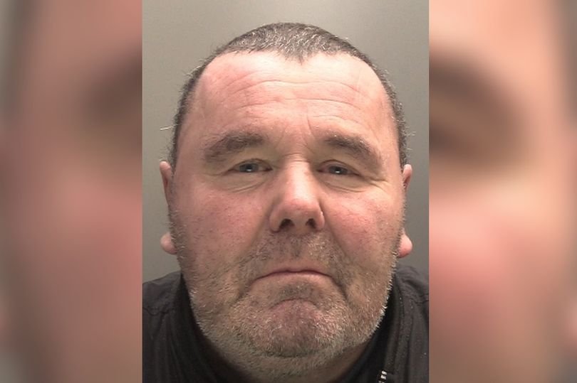 A man in a prison cell, looking out of the window with a mix of sadness and hope, symbolising the complex and often contradictory nature of safety and freedom, with the primary keyword 'prison safety' naturally included