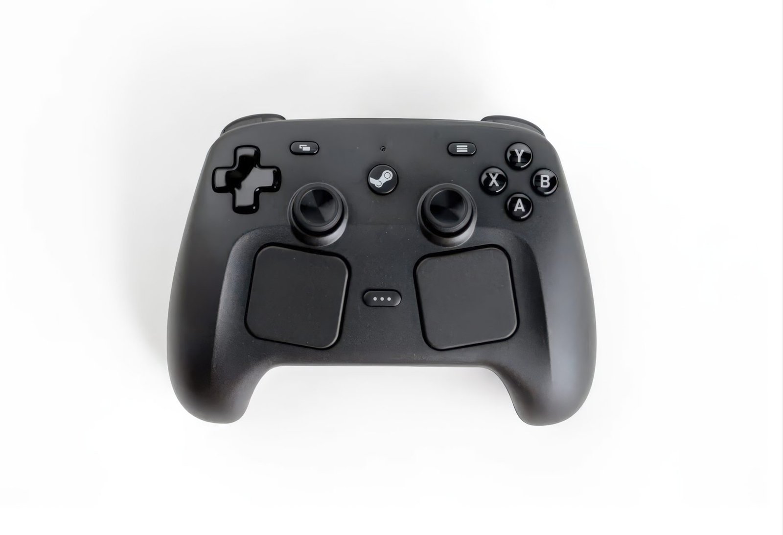 The Steam Controller, a sleek and ergonomic game controller with a range of customisation options and haptic feedback, perfect for UK gamers looking for a versatile and feature-rich device