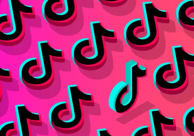 TikTok's logo on a mobile screen, with a cityscape in the background, symbolising the platform's global reach and its ability to navigate complex regulatory environments, with a focus on social media and digital ecosystem