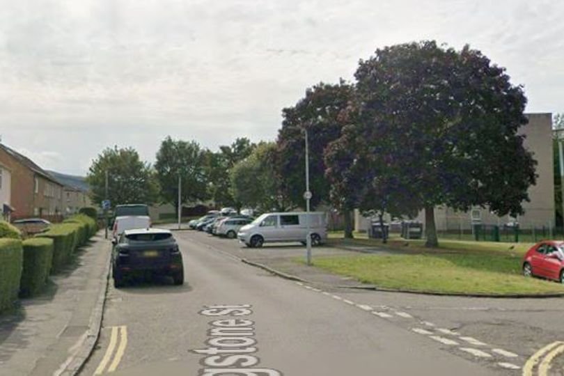 Armed police officers in Edinburgh responding to an ongoing disturbance at a property, with a street locked down and residents being advised to stay indoors, highlighting the importance of public safety and the role of the police in maintaining order