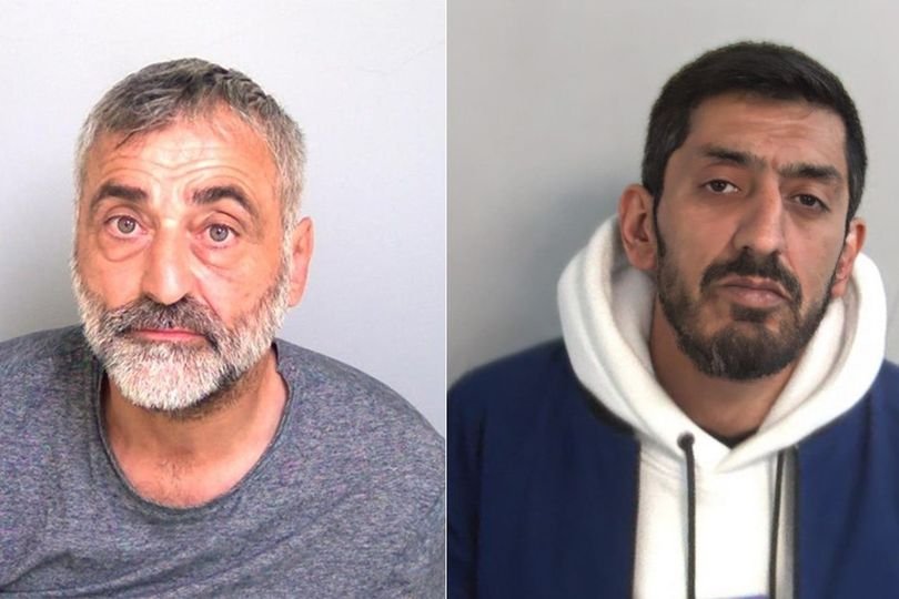 A police officer standing next to a taxi with a man in handcuffs, with a gun and 50 bullets on the ground, the primary keyword firearm is visible in the scene