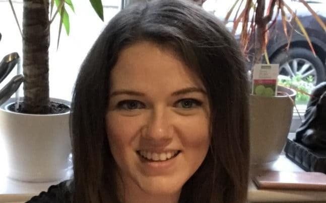 A police car with flashing lights, a reminder of the importance of road safety and responsible driving, with a focus on the fatal accident involving a police officer