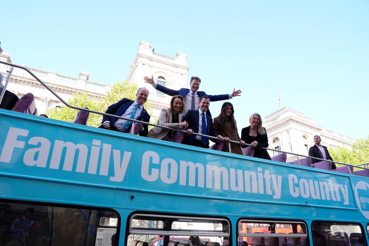 A Reform UK bus and taxi vehicle parked in a street, symbolising the need for sustainable transport solutions and fuel reform, with a cityscape in the background, highlighting the importance of alternative fuel sources and improved public transport infrastructure