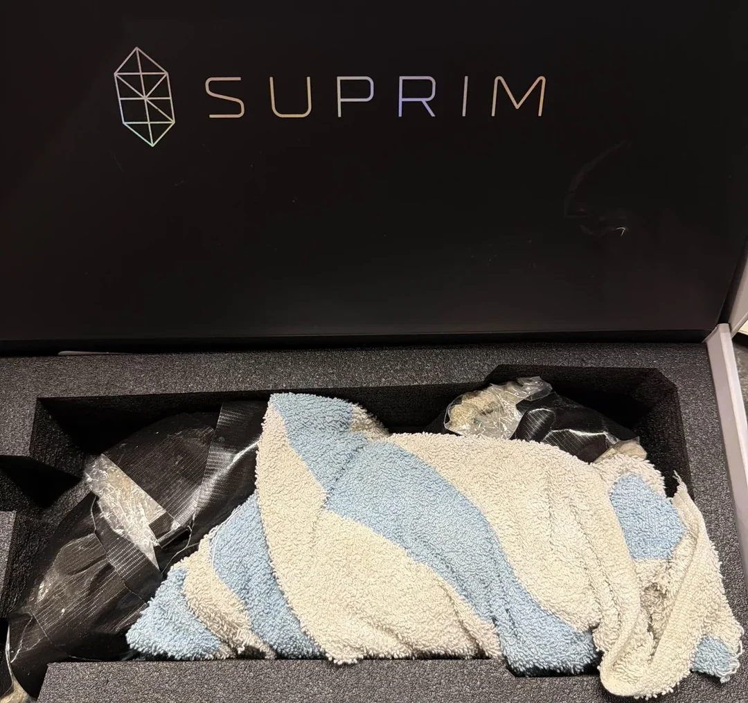 A photo of the NVIDIA RTX 5090 GPU, with a background of rocks and a towel, symbolising the scam that occurred on Amazon, highlighting the importance of being cautious when buying high-end GPUs online, particularly the NVIDIA RTX 5090