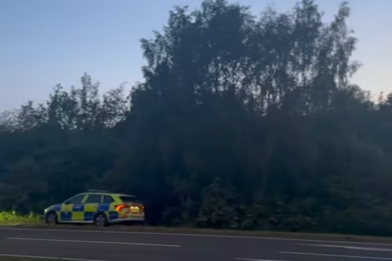 Police cordoning off land near Rainworth Bypass due to suspicious incident, with officers and vehicles at the scene, highlighting the importance of public safety and the need for community vigilance