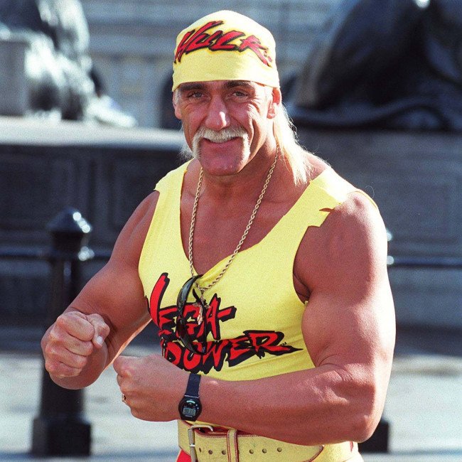Hulk Hogan stands in the wrestling ring, his iconic bandana and moustache a testament to his colourful personality, as he prepares to take on his opponents in the world of professional wrestling, a sport that has been plagued by scandals and controversies, including steroid abuse and violent behaviour