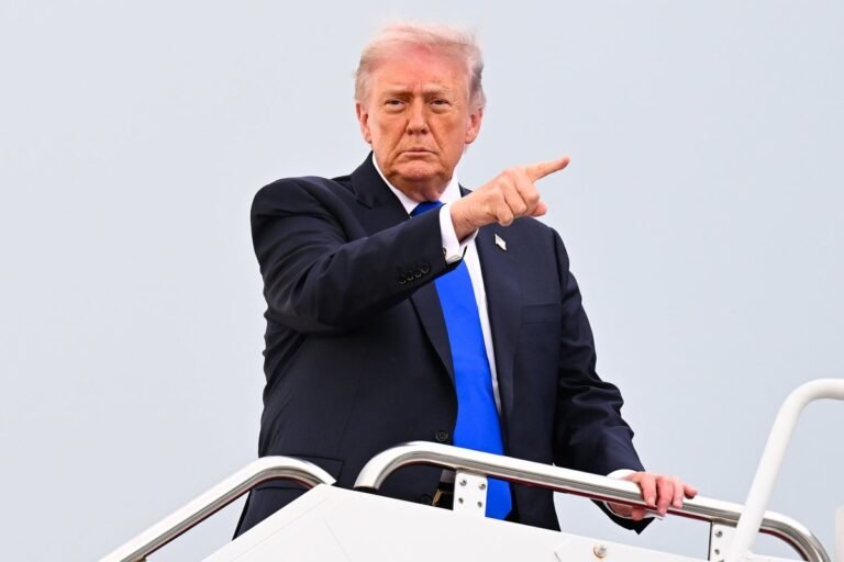 A photo of Donald Trump with a plate of nachos, symbolising his new Wall Street nickname, with a cityscape in the background, representing the financial sector
