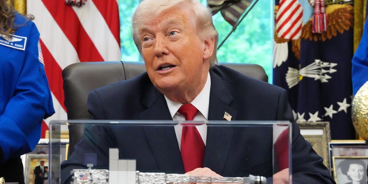 A dramatic photo of the Ukrainian flag waving in the wind, with a sombre colour palette, symbolising the ongoing conflict and the need for a peaceful resolution to the Ukraine war, with Trump and Putin's actions being closely watched by the international community