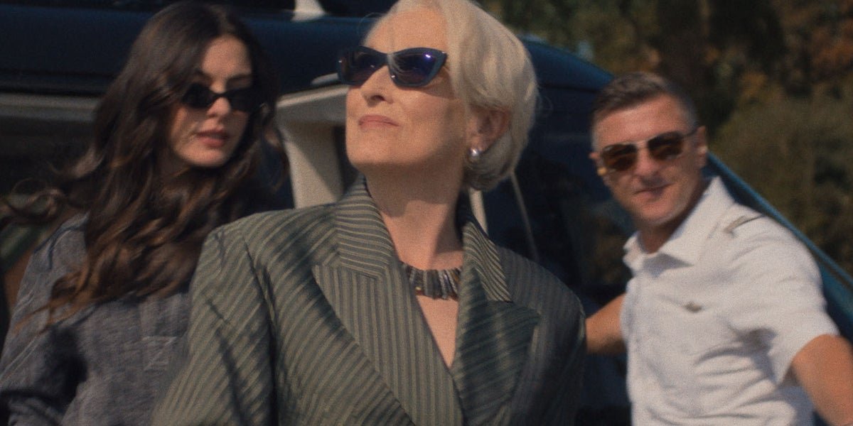 Meryl Streep as Miranda Priestley in The Devil Wears Prada, a film that highlights the importance of fair pay and equality in the workplace, with a focus on the character's demanding behaviour and high expectations, set against the backdrop of the fashion industry