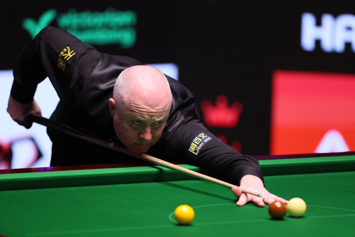 John Higgins in action, demonstrating his exceptional cue control and technique, a key aspect of his secret snooker strategy, allowing him to outmanoeuvre opponents with ease