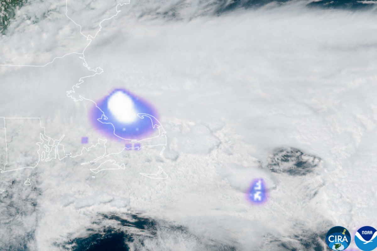 A dramatic image of a sonic boom, with a bright flash of light illuminating the dark sky, as a meteorologist analyses the data to reveal the cause of this rare atmospheric event